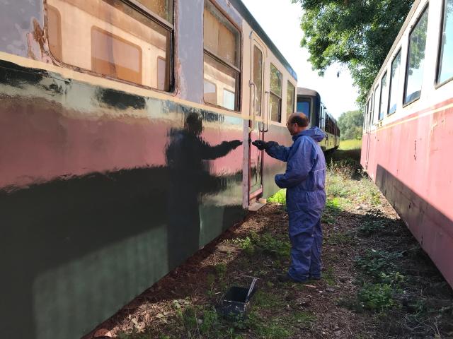 A CFTVA volunteer in the middle of a restoration